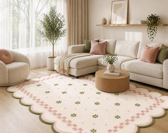 Alfombra floral de lana tejida a mano, con borde festoneado en tonos pastel.