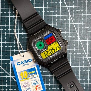 Casio mod Nintendo GameCube World Time AE-1200 Negro Color LCD – Reloj Digital Retro Tech Multicolor