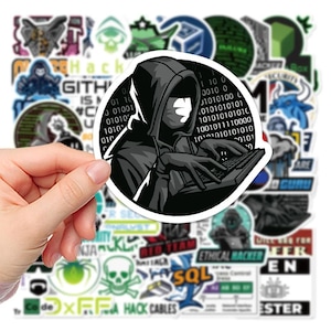 May include: A selection of stickers with a hacker theme. The central sticker shows a hooded figure in black and white, typing on a keyboard, with binary code around it. Other stickers include a skull and crossbones, and text such as "Ethical Hacker" and "SQL".