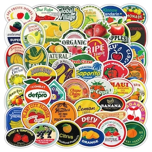 May include: A selection of vibrant fruit-themed stickers with diverse designs. The stickers showcase illustrations of fruits like bananas, apples, and oranges, alongside text such as "Organic" and "Lemon." The stickers are round and oval, with a retro aesthetic.