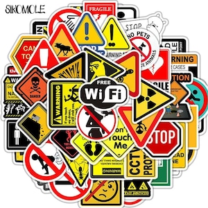 May include: A collection of assorted vinyl stickers featuring various warning signs, prohibition symbols, and hazard icons in yellow, red, black, and white. The stickers include text such as "FREE Wi Fi," "FRAGILE," "STOP," and "DANGER."