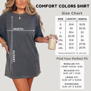 May include: A charcoal grey short-sleeve t-shirt with a size chart displaying length and width measurements in inches. The chart lists sizes from S to 4XL with corresponding dimensions. Text includes COMFORT COLORS SHIRT and Find Your Perfect Fit.