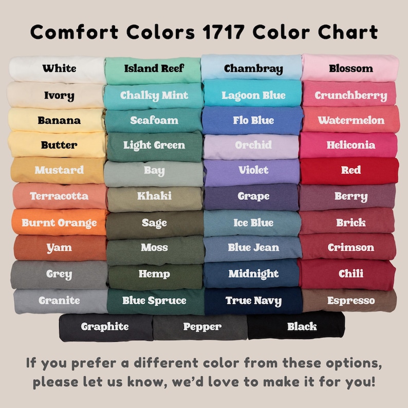 May include: A color chart titled "Comfort Colors 1717 Color Chart" displays a variety of fabric colors. The chart includes shades like white, ivory, banana, butter, mustard, terracotta, burnt orange, yam, grey, and granite. Additional colors are also shown.