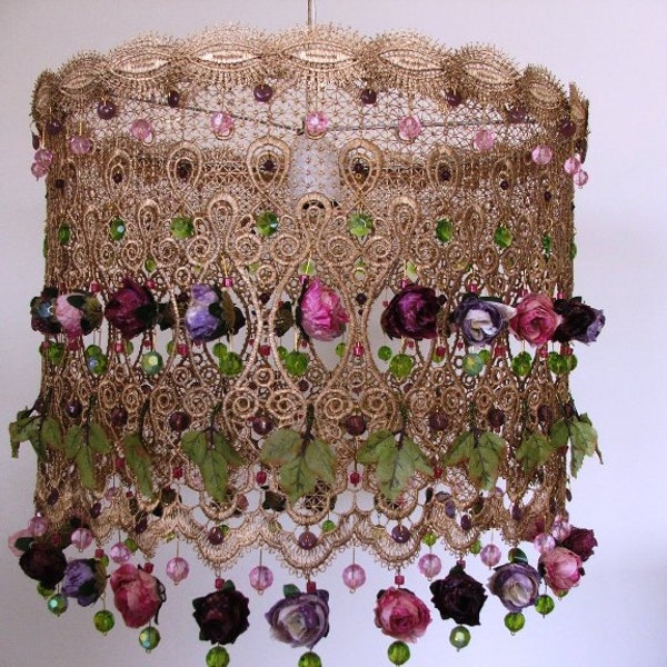 A celebration of Swarovski crystals beads, antique-style roses, and golden lace in a large romantic chandelier-style ceiling lamp shade