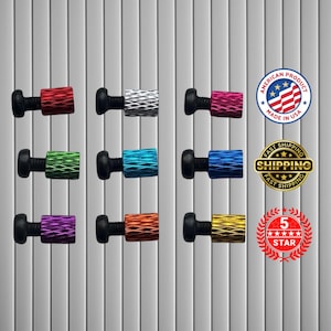 May include: A collection of colorful, textured bolts with black heads. The bolts come in various colors, including red, silver, pink, green, blue, purple, orange, and yellow. The image also includes a "Made in USA" seal and a "5 Star" seal.