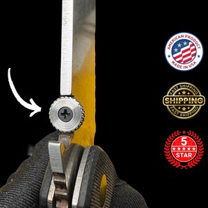 May include: Close-up of a partially open folding knife with a silver blade and a textured, circular screw. The blade is positioned against a yellow surface. The image includes a "Made in USA" seal and a "Fast Shipping" seal.