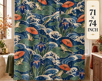 May include: A shower curtain featuring a repeating pattern of green frogs holding orange umbrellas, blue iris flowers, and stylised white waves on a dark blue background. The curtain includes a label stating 71 x 74 INCH.