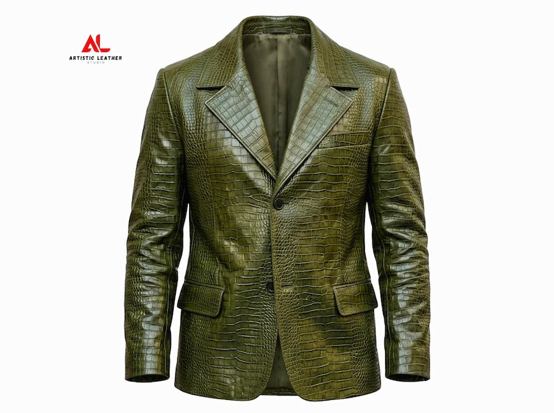 May include: An olive green blazer featuring a textured crocodile skin pattern, a notched lapel, two front buttons, and two flap pockets. The upper left corner displays the logo and text AL ARTISTIC LEATHER STUDIO in red and black lettering.