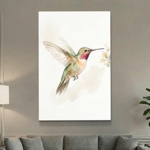 May include: Watercolor painting of a hummingbird in flight, with wings spread. The bird has green, red, and white feathers. It is approaching a small cluster of yellow flowers. The background is a soft, neutral color.
