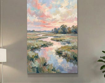 May include: A vertical oil painting on canvas depicting a marshland landscape at sunset. The scene features a winding creek reflecting a sky filled with soft pink, peach, and blue clouds, surrounded by textured green and brown marsh grasses.