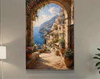 May include: A vertical wall art print depicting a stone archway framing a coastal Mediterranean village. The scene features a cobblestone path, terracotta pots with pink flowers, white buildings built into a cliffside, and a blue sea.