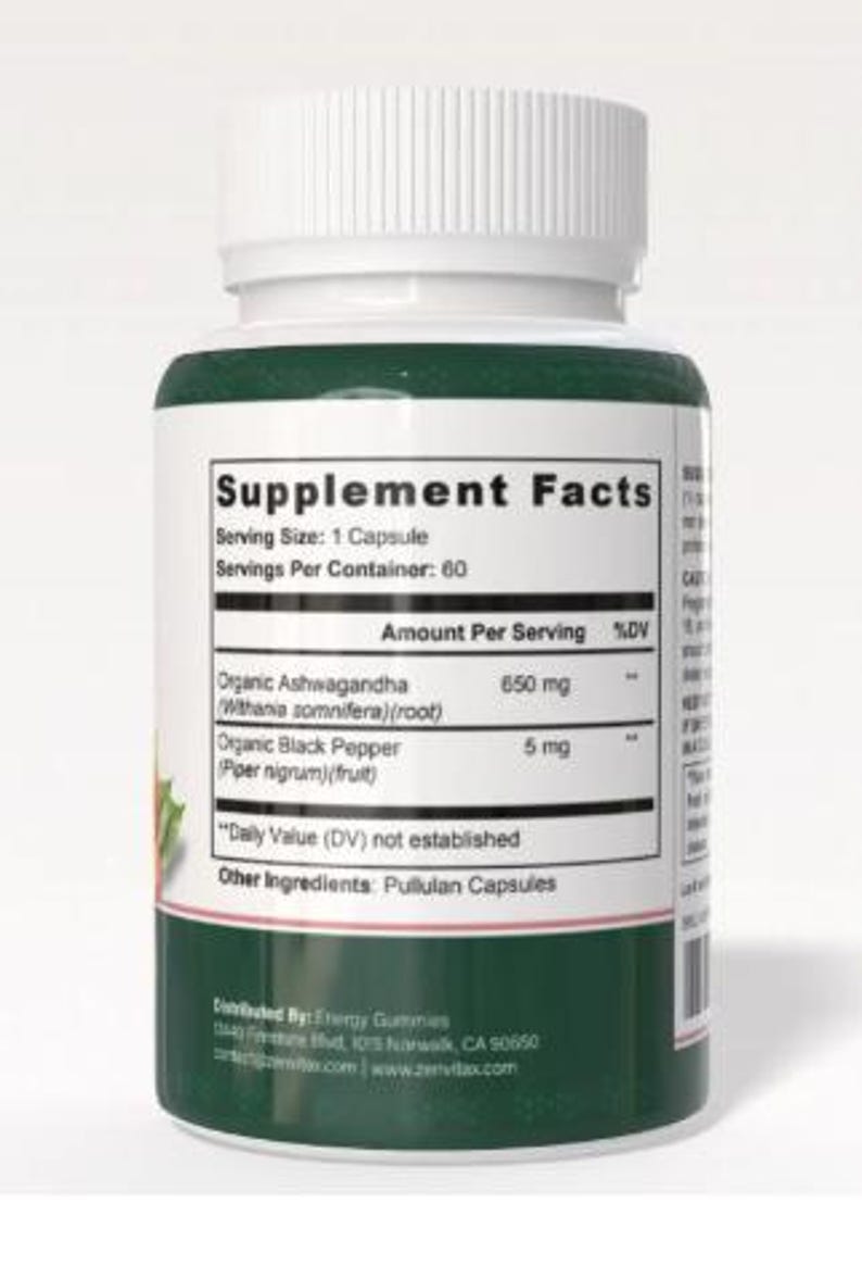 May include: A white plastic supplement bottle with a white lid and a green label. The label includes the text "Supplement Facts" and lists ingredients like Organic Ashwagandha and Organic Black Pepper. The bottle contains 60 capsules.