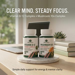 May include: Two white supplement bottles with green labels are displayed on a marble tray. The bottles are labeled "Vitamin B-12 Energy Complex" and "Mushroom 10X Mind Boost." The text "Clear Mind. Steady Focus" is at the top, with "Simple daily support for energy & mental clarity" at the bottom.