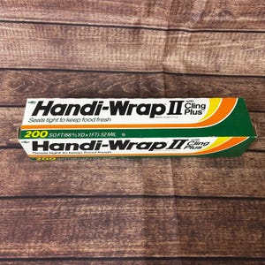 Película plástica sellada Dow Handi-Wrap II Cling Plus de 1982, 200 pies cuadrados.