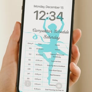 May include: A smartphone screen shows a dance competition schedule for Saturday, December 15th, at 12:34. The display includes a teal dancer silhouette and a list of dance entries with times and dance names. The phone is held in a hand.