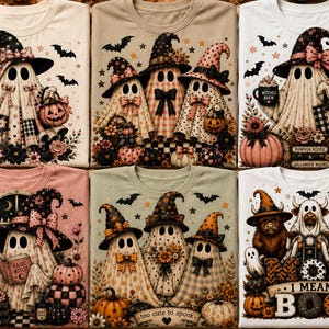 Könnte beinhalten: Eine Kollektion von sechs T-Shirts mit Halloween-Motiven wie Geistern, Hexen und Kürbissen in verschiedenen Farben. Die Designs zeigen Geister mit Hüten, die Bücher lesen oder Kürbisse halten, sowie Schriftzüge wie 'Moo I Mean Boo' und 'Spooky but Sweet'.
