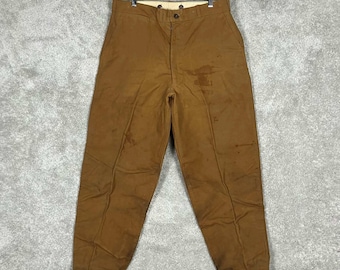 Pantalones de caza Saf-T-Bak vintage de los años 60 para hombre, de lona marrón repelente al agua, con puños en las piernas.