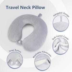 May include: A gray travel neck pillow with a snap button closure and a hangable design. The pillow has a soft velvet cover and a washable pillowcase. The text "Travel Neck Pillow" is at the top of the image.