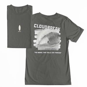 May include: Dark grey t-shirt with a white surfboard graphic and the word "DRIFT" on the front. The back features a large wave graphic with the text "CLOUDBREAK" and "THE BARREL THAT FEELS LIKE FOREVER".