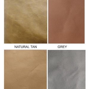 May include: A grid of four leather swatches labeled Tan Distress, Reddish Tan, Natural Tan, and Grey. Each swatch displays a distinct color and texture, showing the variations in the material surface across the four different color options.