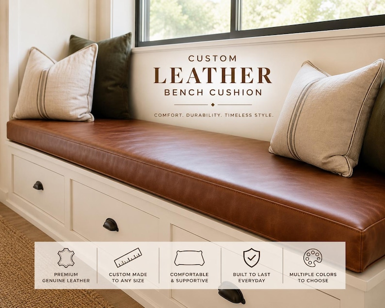 May include: A brown leather bench cushion sits atop a white storage bench with drawers. The text reads CUSTOM LEATHER BENCH CUSHION. COMFORT. DURABILITY. TIMELESS STYLE. Icons indicate premium genuine leather, custom sizing, and color options.