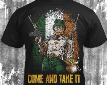 さあ、連れて行こう - ユーズド加工のタクティカルレプラコーンガンTシャツ：セントパトリックスデーの楽しいギフト