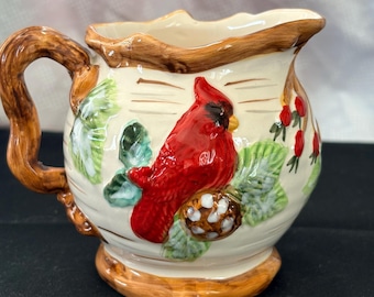 Ceramic Christmas evergreen and cardinal decorative Creamer.