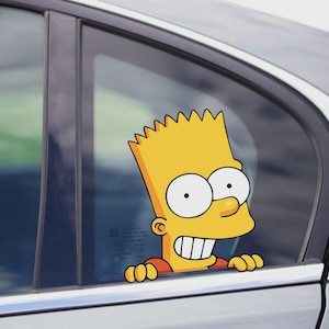 May include: A yellow Bart Simpson car sticker, showing the character's distinctive spiky hair, large eyes, and cheeky grin. The sticker is applied to a car window, with the character's arms appearing to rest on the window frame.