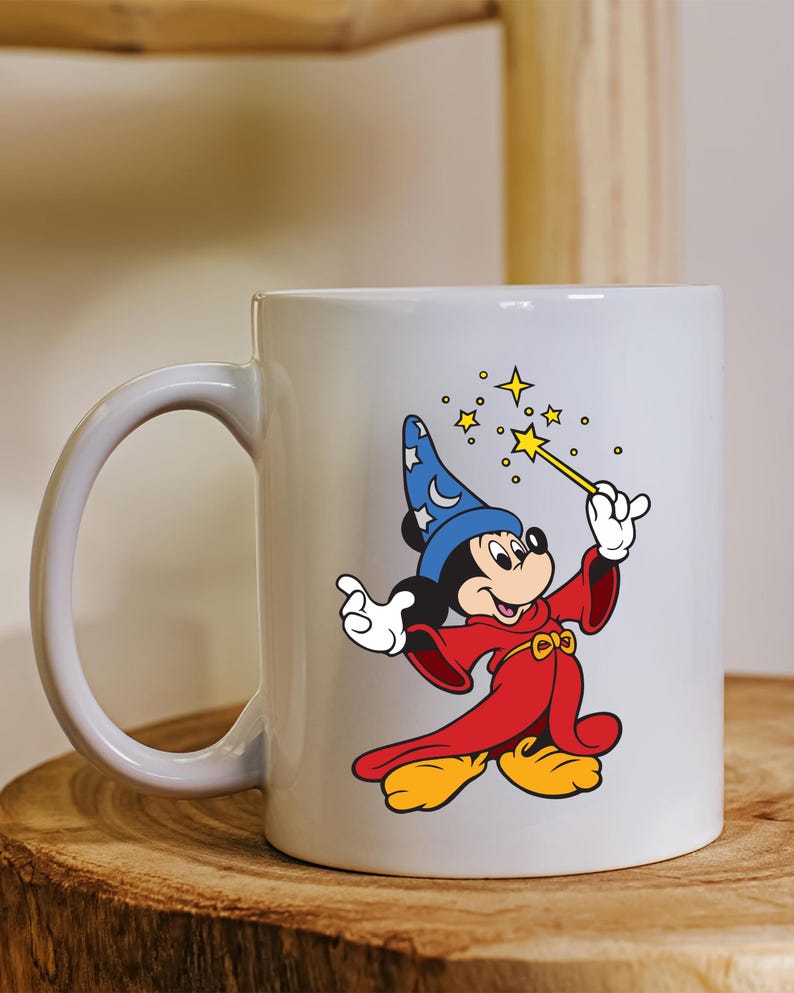 May include: A trio of cream-glazed ceramic mugs, each adorned with a hand-painted design. One features a blue and green leaf, another a yellow flower, and the last a red berry. The mugs have a rounded form.