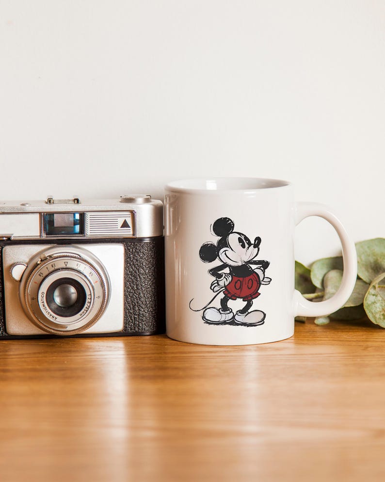 May include: A handmade wooden sign displaying the word "Welcome" in a whimsical font. The white-painted sign has a distressed finish, and is adorned with a floral design in pink and green hues. Suitable for indoor or outdoor display.