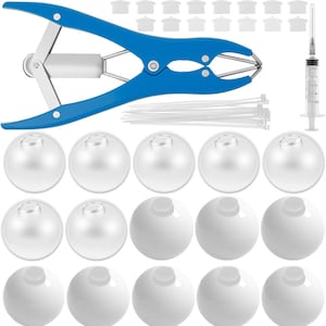 May include: A collection of veterinary tools and supplies, including a blue and silver applicator, a syringe, white cable ties, and several clear and white plastic components. The items are arranged on a white background.