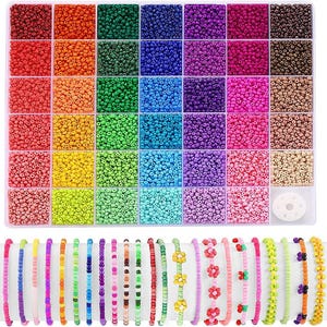 May include: A craft kit with a variety of colourful beads in a clear plastic organiser. Below, a display of beaded bracelets in various colours and designs, including floral and patterned styles. Ideal for jewellery making.