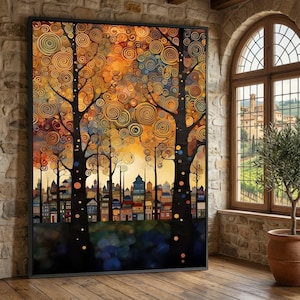 May include: Large framed art print depicting a stylized landscape. The artwork shows trees with spiral-shaped leaves in gold, orange, and yellow. A cityscape with colourful buildings is visible below the trees. The frame is black.