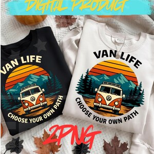 May include: Black and white sweatshirts with a graphic design featuring a vintage van, mountains, and a sunset. The text reads "VAN LIFE" and "CHOOSE YOUR OWN PATH". The image also includes the text "DIGITAL PRODUCT" and "2 PNG".