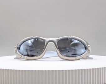 Oakley Minute 1.0 zonnebril – zilverkleurig montuur met licht spiegelende glazen