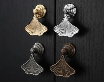 Goudkleurige kastknop met ginkgoblad – decoratief handvat voor ventilatordressoir