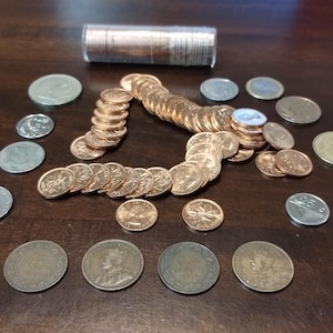 Vintage Canadian Cent Collection: 64 Coins, 1890-1966