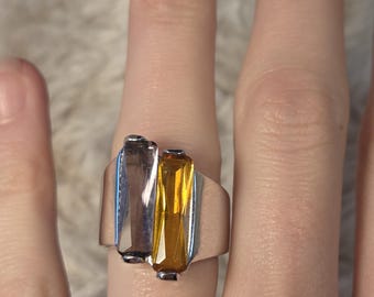 Silber-Band mit lila und orangefarbenem Stein