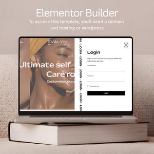 May include: A laptop displaying a website login page with the text "Login" and fields for email and password. The screen also shows the text "Ultimate self Care ro Customized sking" and the brand name "EVALYN". The laptop is resting on a thick book.