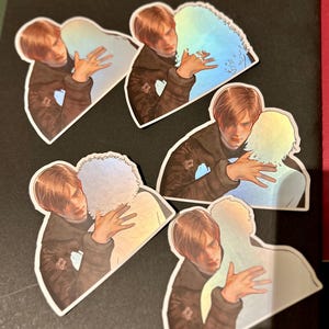 May include: Five die-cut stickers featuring a character with light brown hair wearing a dark jacket. The character is shown in various poses interacting with a holographic, iridescent silhouette. The stickers have a white border and a glossy finish.