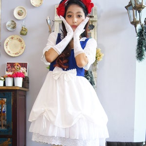 Kawaii Snow White costume, made from cotton, chiffon, and lace, adjustable skirt, short puffy sleeve, collared neckline, and it can be made based on your measurement.