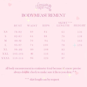 May include: A pink and white chart with the text "Body Measurement" and a table listing sizes, bust, waist, hips, skirt length, and height measurements in inches. The table includes sizes XS, S, M, L, XL, XXL, and XXXL.