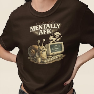 May include: A set of three ceramic mugs with a speckled, cream-colored glaze. Each mug features a different hand-painted floral design in shades of blue, green, and yellow. The mugs have a simple, rounded shape and a comfortable handle.