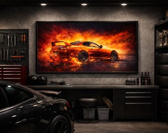 May include: An orange sports car art print displayed in a garage setting. The artwork depicts the car engulfed in flames. The garage features tools, a toolbox, tires, and a black car in the foreground. The overall theme is automotive and speed.