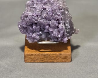 Grape Agate specimen on stand