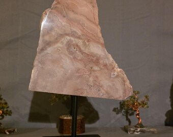 Pink amethyst slab on stand