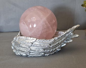 Rose quartz sphere and wings sphere stand