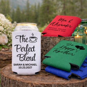 Custom wedding can coolers styled for outdoor ceremonies, mountain venues, and rustic receptions. Personalized foam sleeves are printed with names, wedding dates, and locations, creating functional favors guests actually use. Designed for beer and soda cans, they keep drinks cold while enhancing tables and bar setups. Ideal for bulk wedding favors, engagement parties, and welcome bags. Made to order with clean, durable printing and smooth foam for long lasting celebration use. Always cherished.