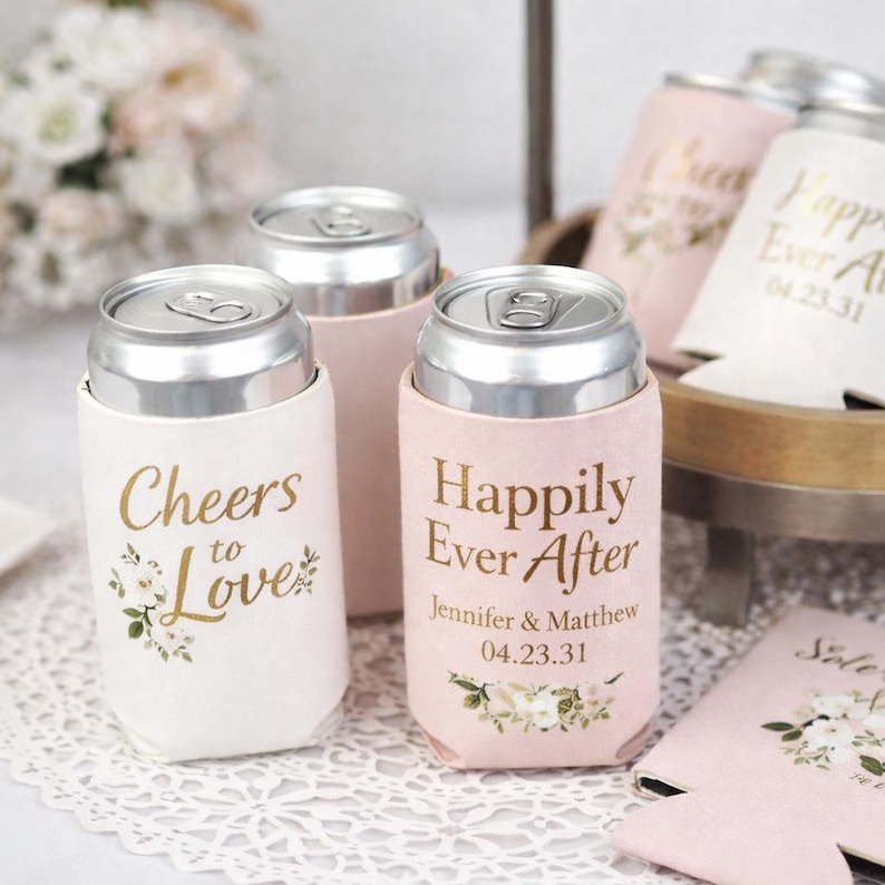 Elegant wedding can coolers personalized with names and wedding date. Soft blush and ivory designs create a romantic reception detail guests love. Perfect for wedding favors, bridal showers, and engagement parties. Insulated foam keeps drinks cold and hands dry during celebrations. Made to order with crisp printing and premium material. Ideal for classic, garden, and modern weddings where thoughtful details make lasting memories. Guests appreciate stylish favors that elevate every toast. Always!