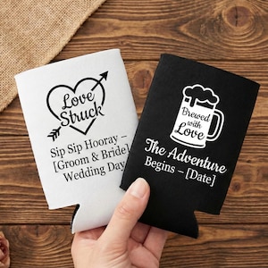 Personalized wedding can coolers shown in classic black and white designs for timeless celebrations. Custom printed foam sleeves feature romantic phrases, names, and wedding dates for meaningful guest favors. Designed for beer and soda cans, they keep drinks cold while adding charm to reception tables. Ideal for rustic, modern, or traditional weddings. Popular for bulk orders, bar setups, and welcome gifts. Made to order with durable foam and crisp, high contrast printing.